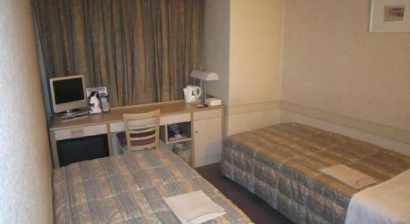 Bed in Hotel South Garden Hamamatsu