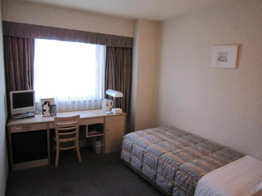 Bed in Hotel South Garden Hamamatsu