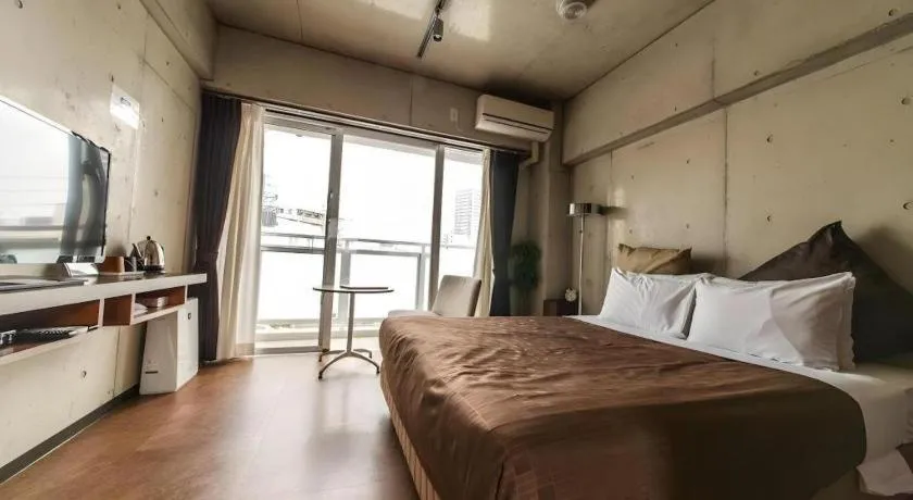 Bed in Condominio Makishi
