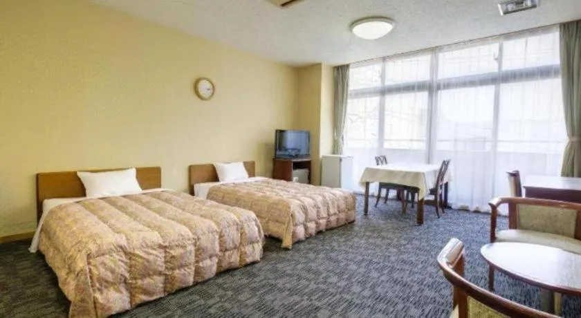 Bed in Yugawara Mizu No Kaori Hotel