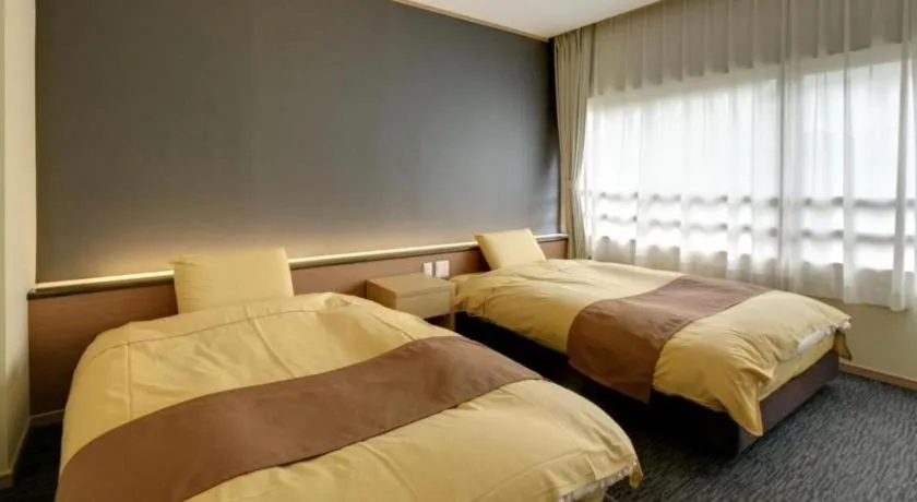 Bed in Yugawara Mizu No Kaori Hotel