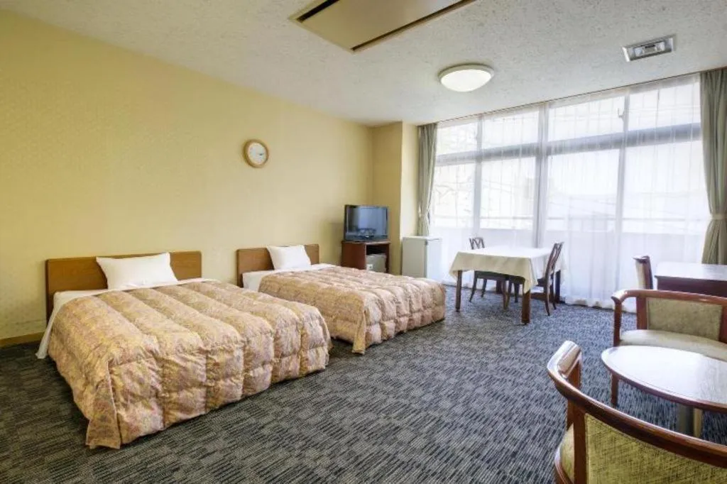 Bed in Yugawara Mizu No Kaori Hotel