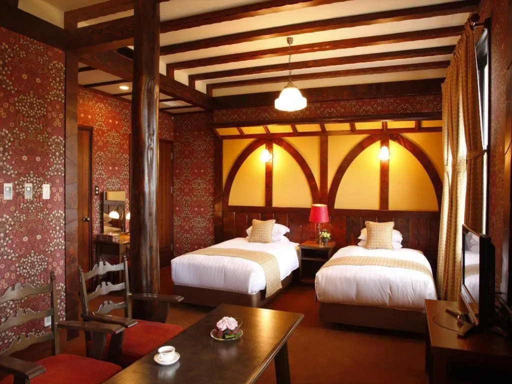 Bed in Unzen Kanko Hotel