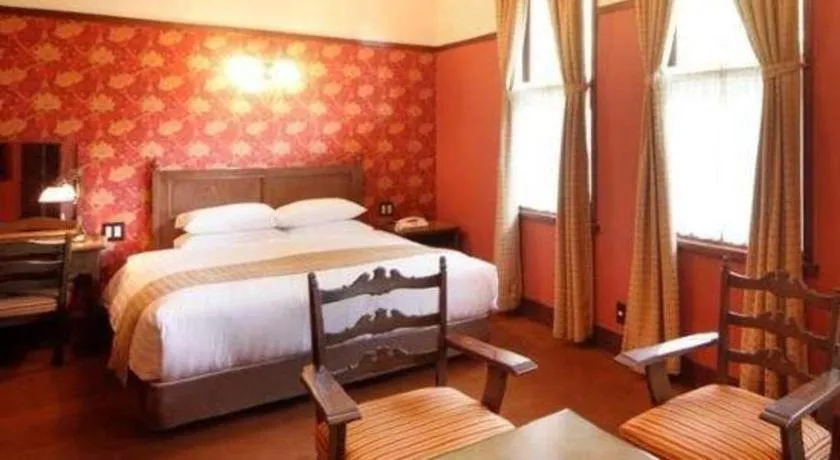 Bed in Unzen Kanko Hotel