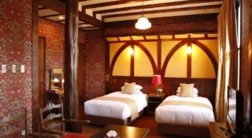 Bed in Unzen Kanko Hotel