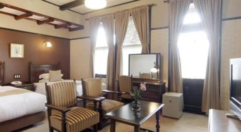 Bed in Unzen Kanko Hotel