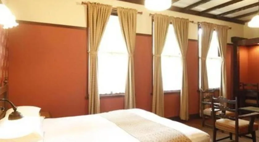 Bed in Unzen Kanko Hotel