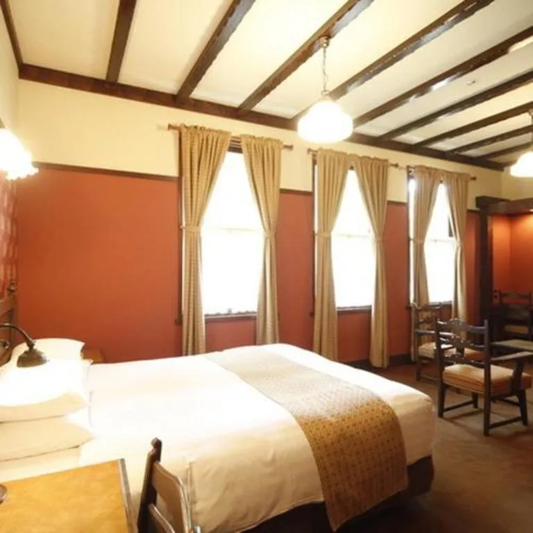 Bed in Unzen Kanko Hotel