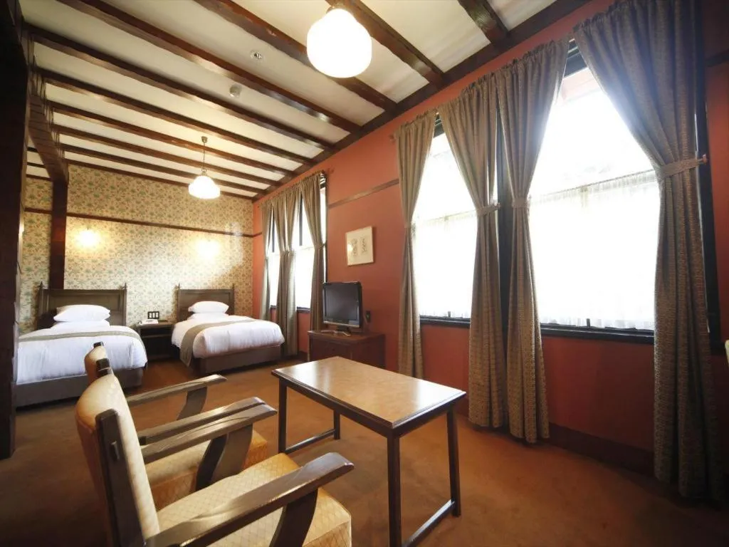 Bed in Unzen Kanko Hotel