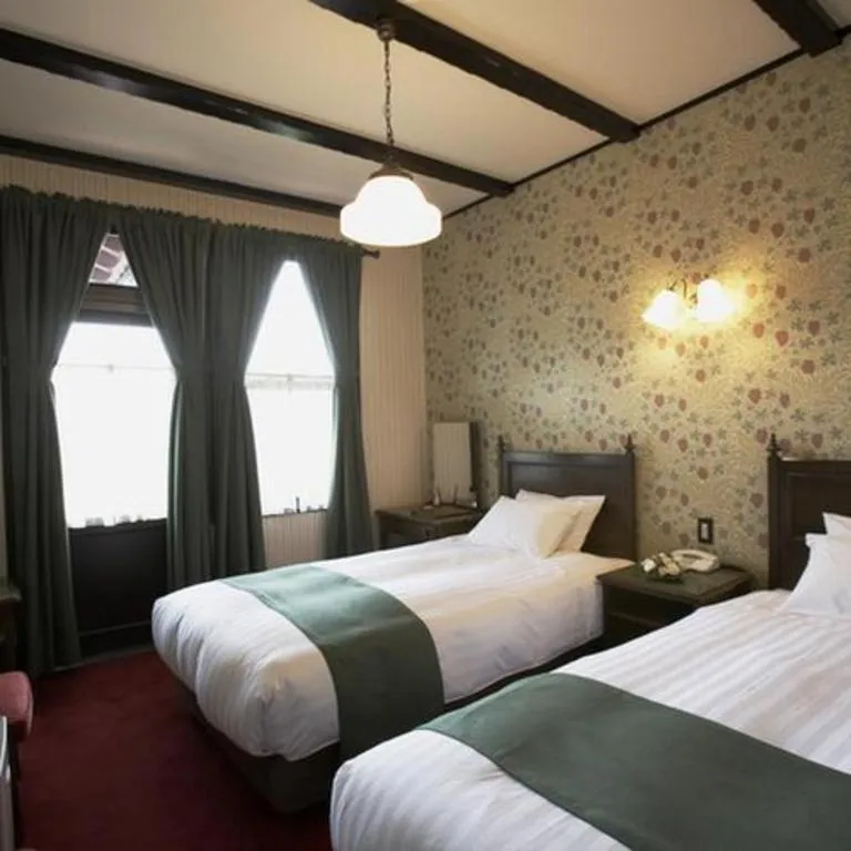 Bed in Unzen Kanko Hotel