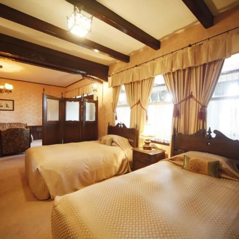 Bed in Unzen Kanko Hotel