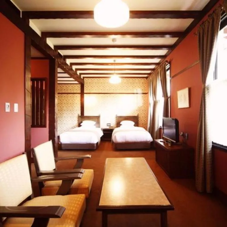 Bed in Unzen Kanko Hotel