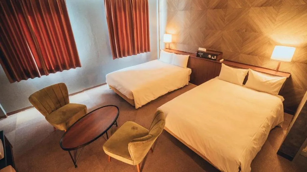 Bed in Hotel AreaOne Miyazaki City