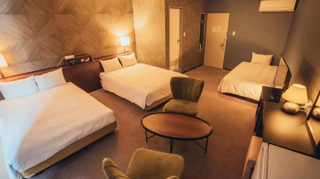 Bed in Hotel AreaOne Miyazaki City