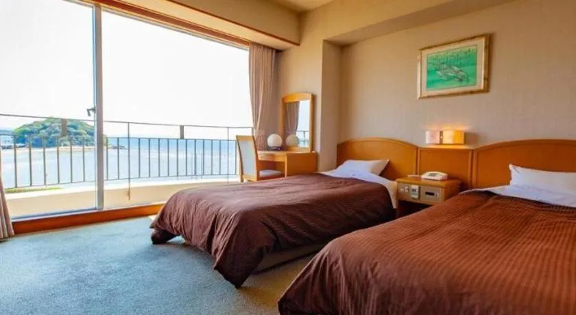 Bed in Hotel Takeshima