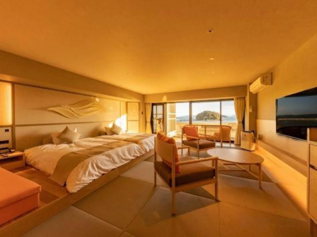 Bed in Hotel Takeshima