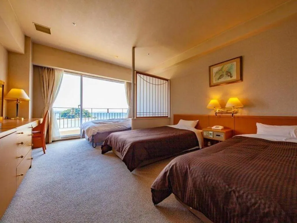 Bed in Hotel Takeshima