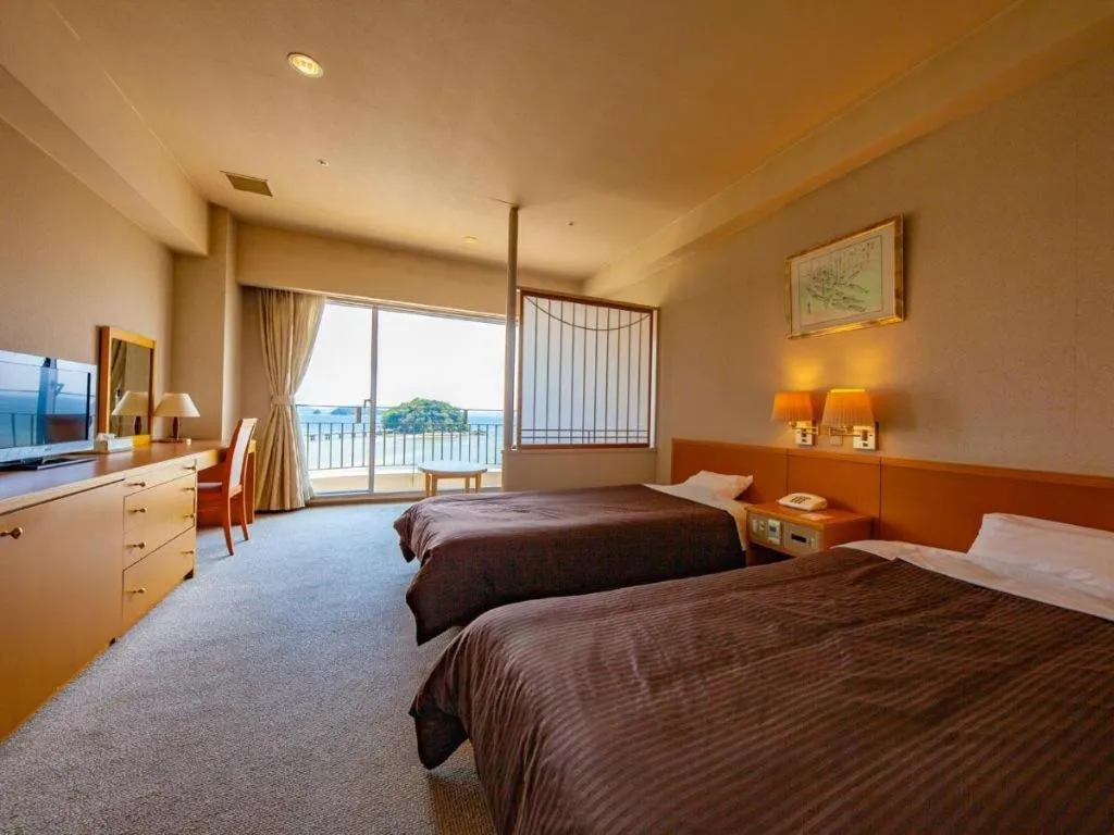 Bed in Hotel Takeshima