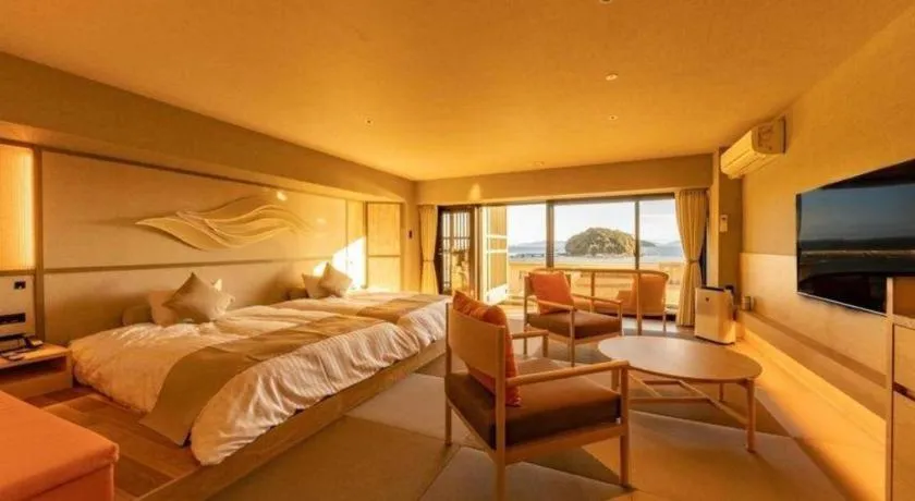 Bed in Hotel Takeshima