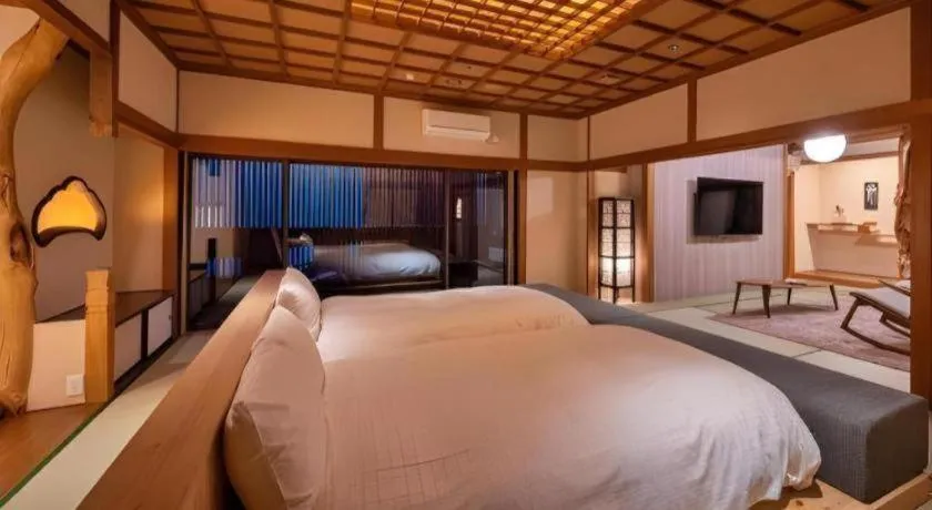 Bed in Hotel Matsumotoro
