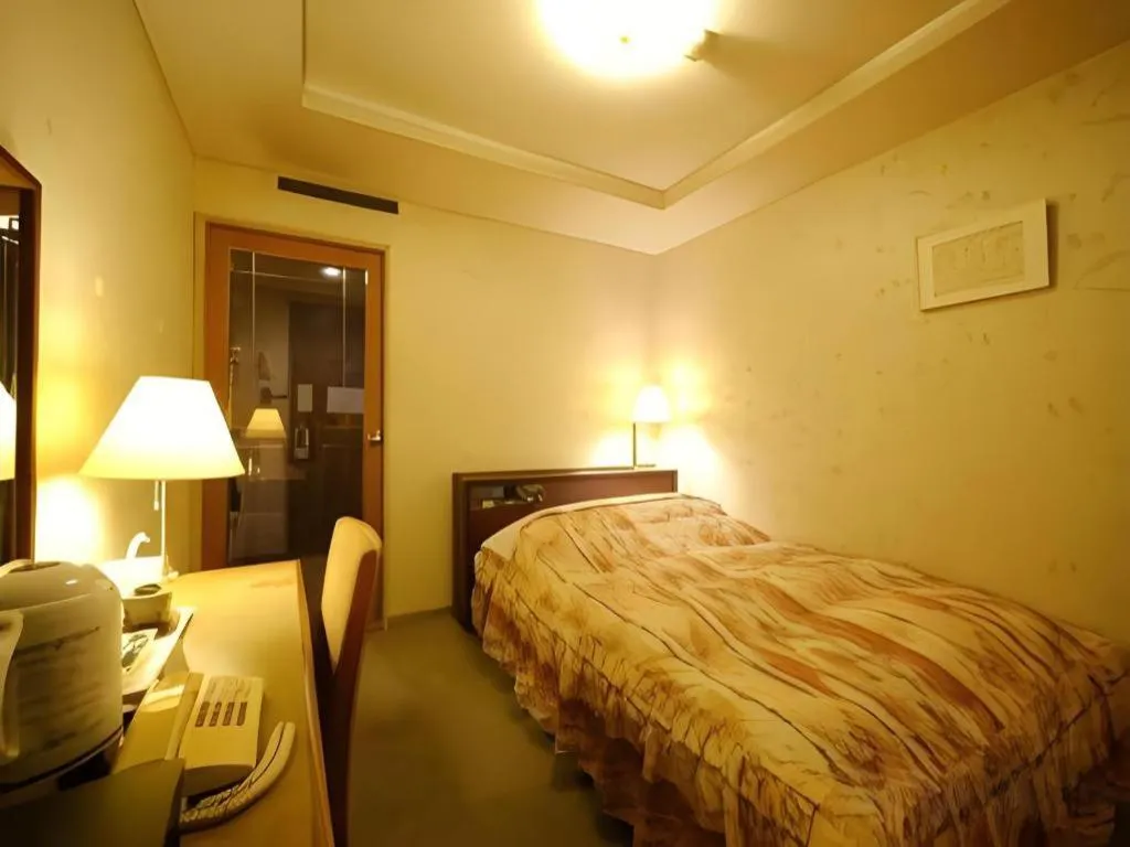 Bed in Hotel Fukui Castle