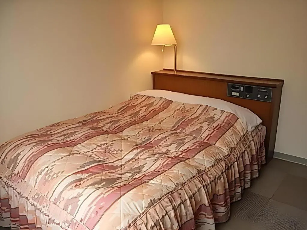 Bed in Hotel Fukui Castle