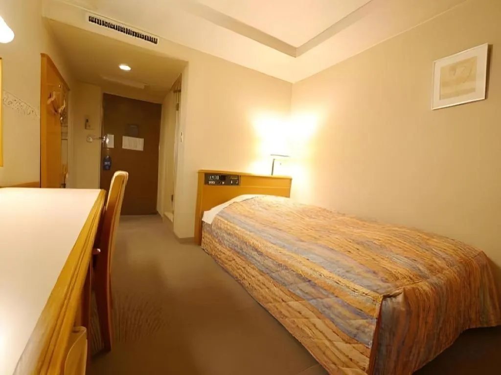 Bed in Hotel Fukui Castle