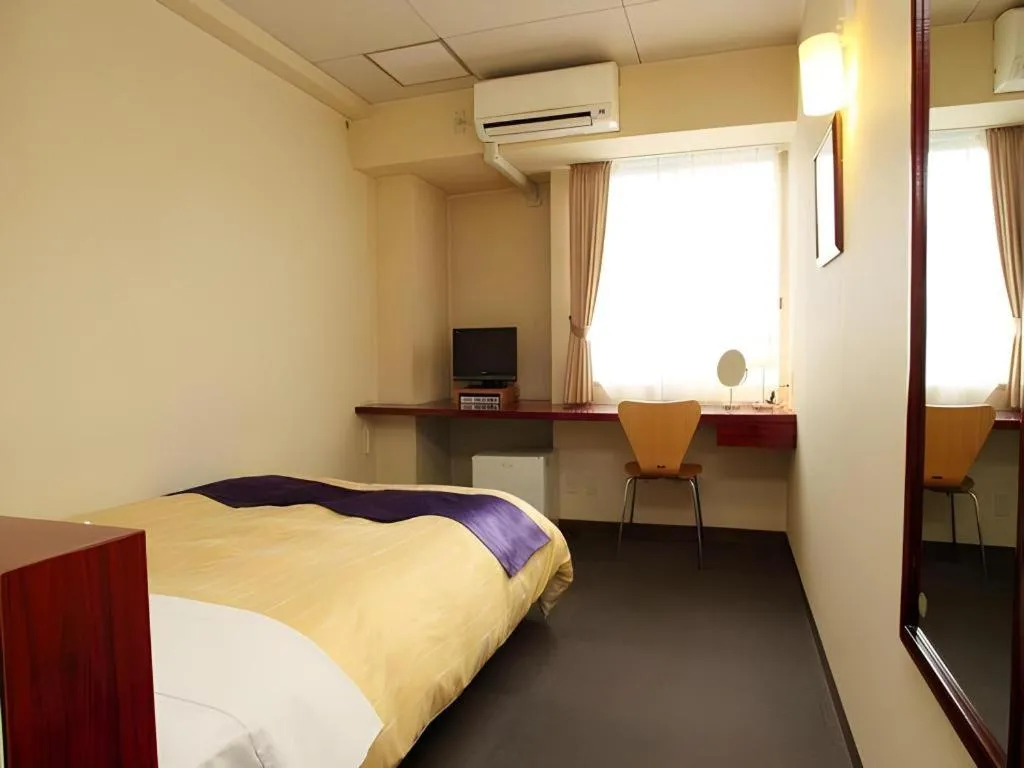 Bed in Hotel 1-2-3 Kofu Shingen Onsen