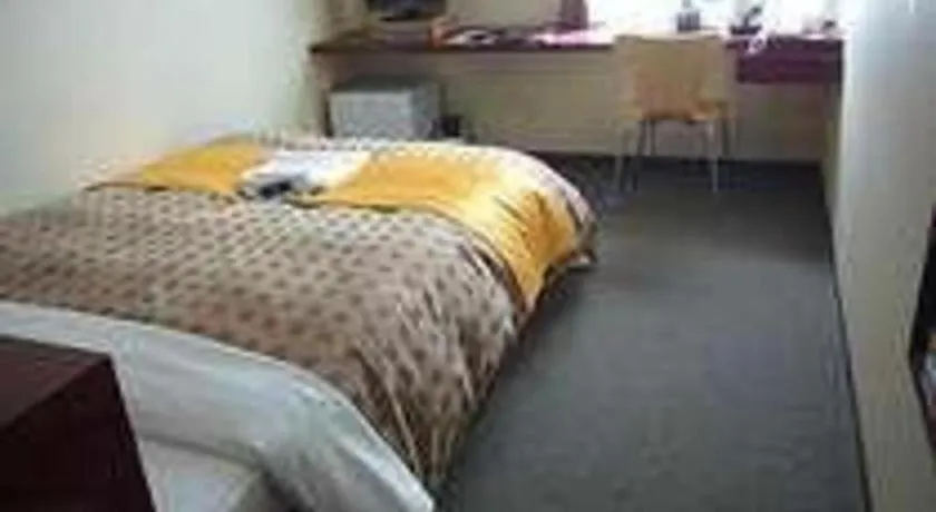 Bed in Hotel 1-2-3 Kofu Shingen Onsen