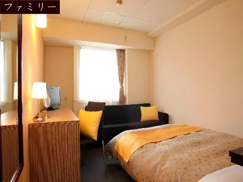 Bed in Hotel 1-2-3 Kofu Shingen Onsen