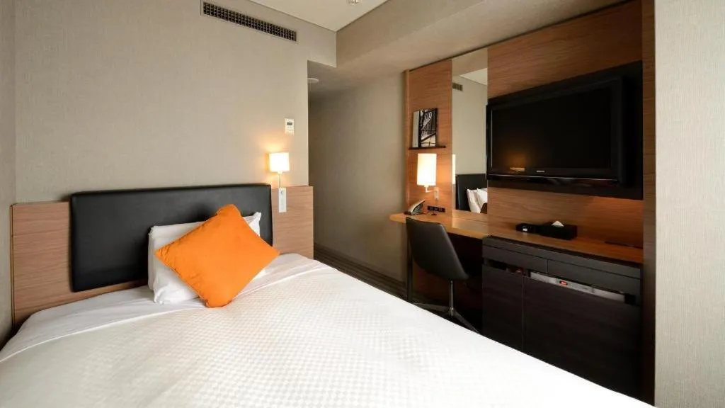 Bed in HOTEL UNIZO Osaka Yodoyabashi