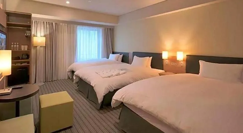 Bed in HOTEL UNIZO Osaka Yodoyabashi