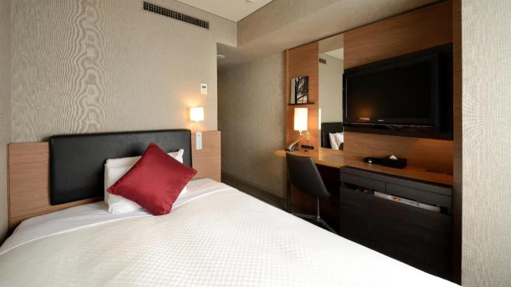 Bed in HOTEL UNIZO Osaka Yodoyabashi