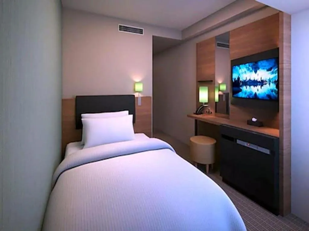 Bed in HOTEL UNIZO Osaka Yodoyabashi