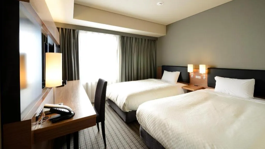 Bed in HOTEL UNIZO Osaka Yodoyabashi