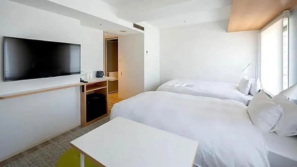 Bed in HOTEL UNIZO Osaka Yodoyabashi