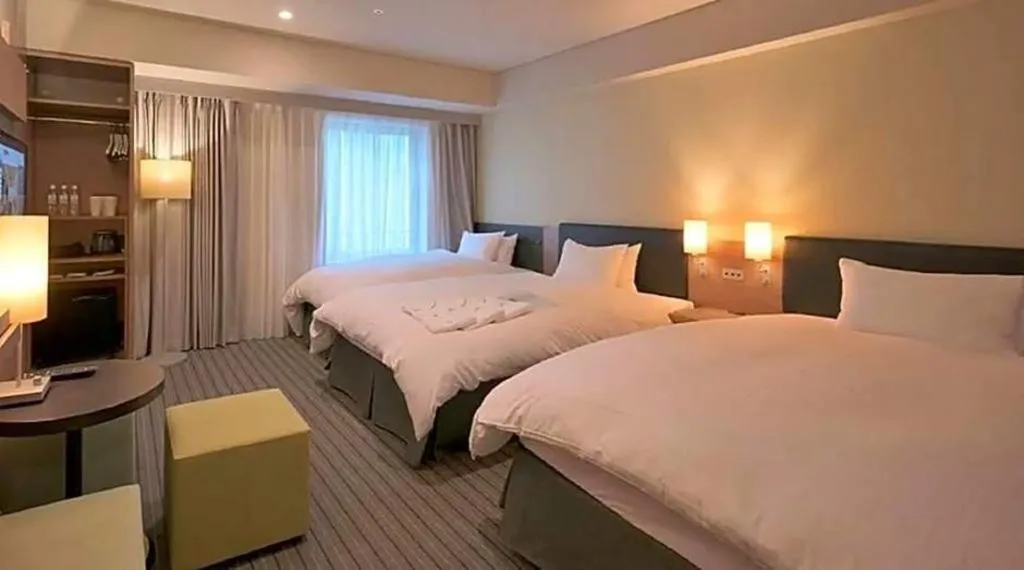 Bed in HOTEL UNIZO Osaka Yodoyabashi