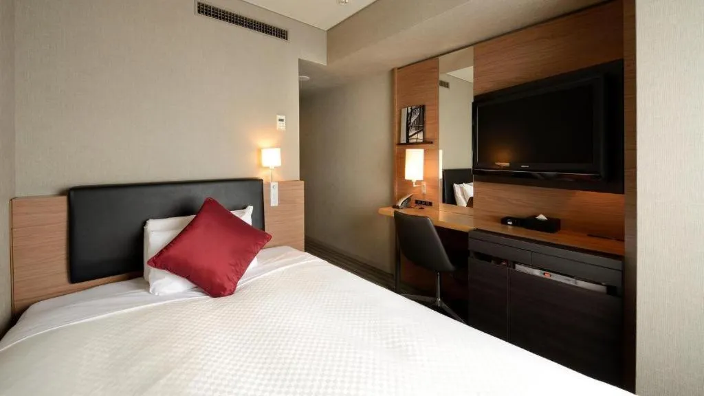 Bed in HOTEL UNIZO Osaka Yodoyabashi