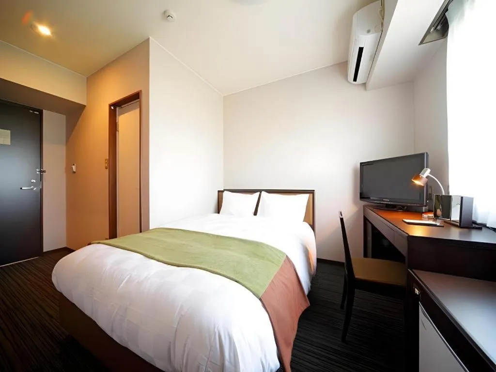 Bed in Green Hotel Yes Nagahama Minatokan