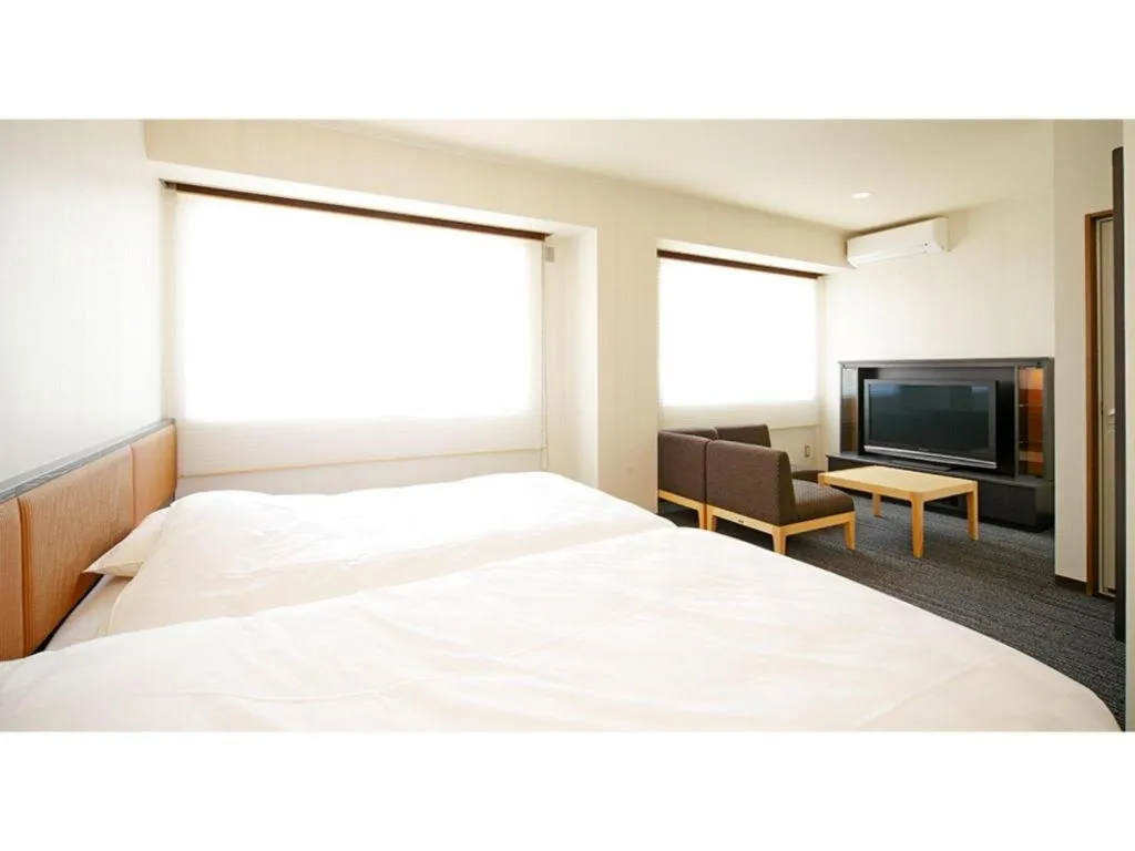 Bed in Green Hotel Yes Nagahama Minatokan