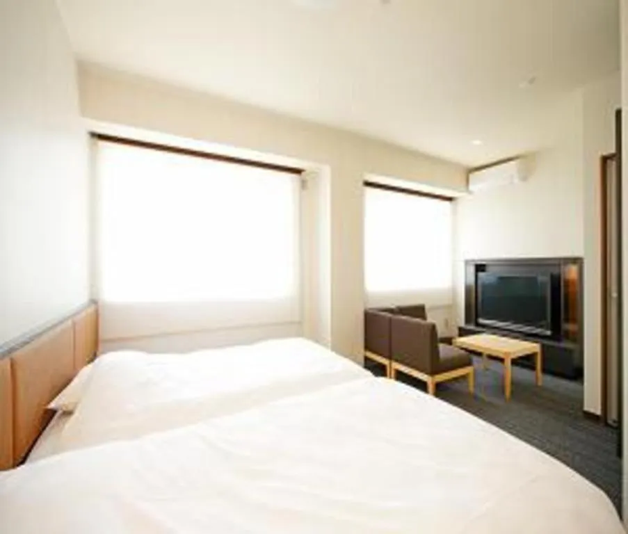 Bed in Green Hotel Yes Nagahama Minatokan