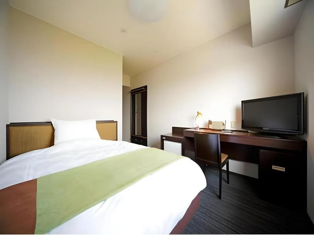 Bed in Green Hotel Yes Nagahama Minatokan