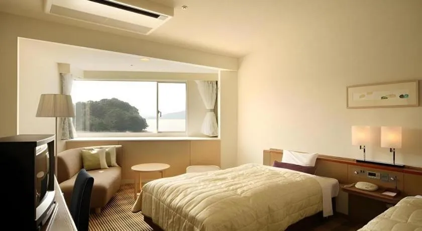 Bed in Hotel Harvest Hamanako