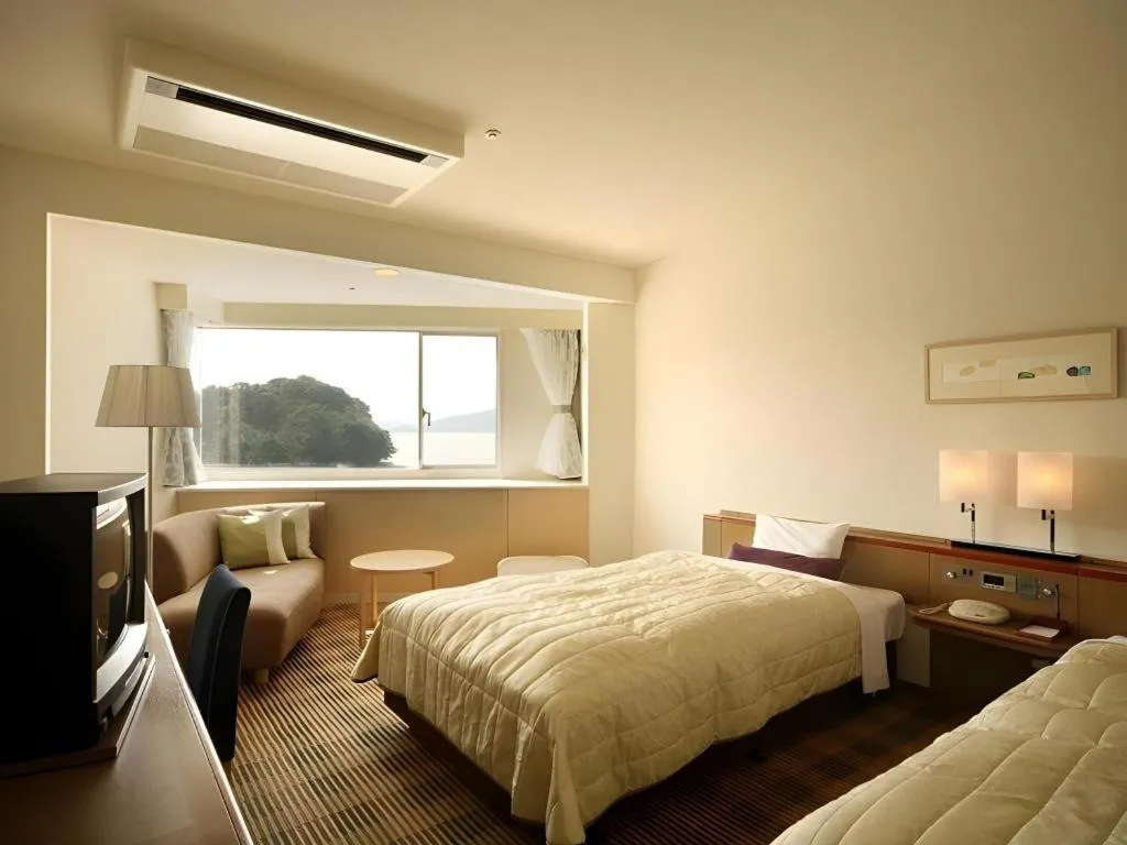 Bed in Hotel Harvest Hamanako