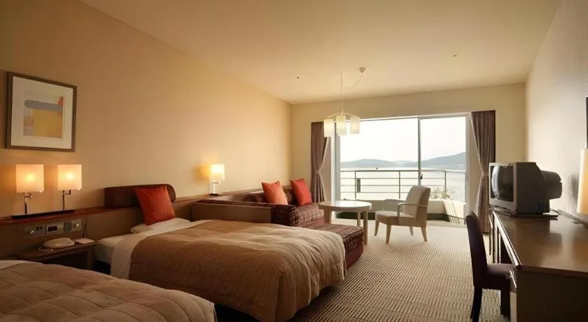 Bed in Hotel Harvest Hamanako