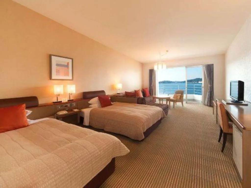 Bed in Hotel Harvest Hamanako