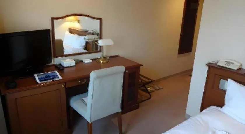 Bed in Hotel Harvest In Yonago