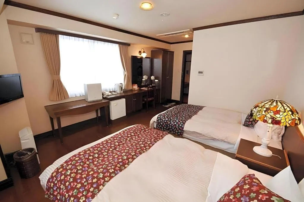 Bed in Otaru Furukawa Hotel