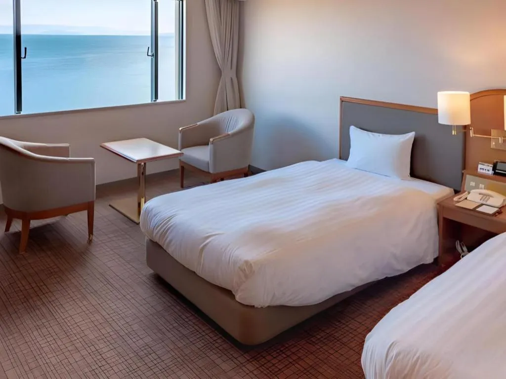 Bed in Imazu Sun Bridge Hotel