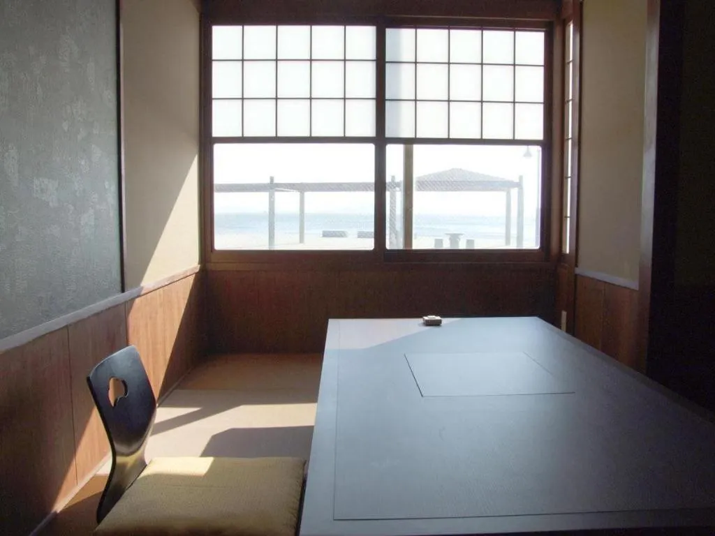 Bed in Shinojima Royal Hotel Kasuisou